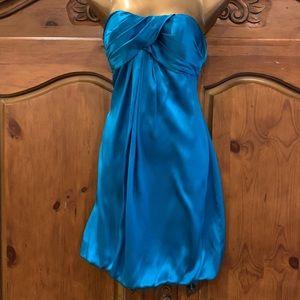 Cache size 10  Turquoise silk dress